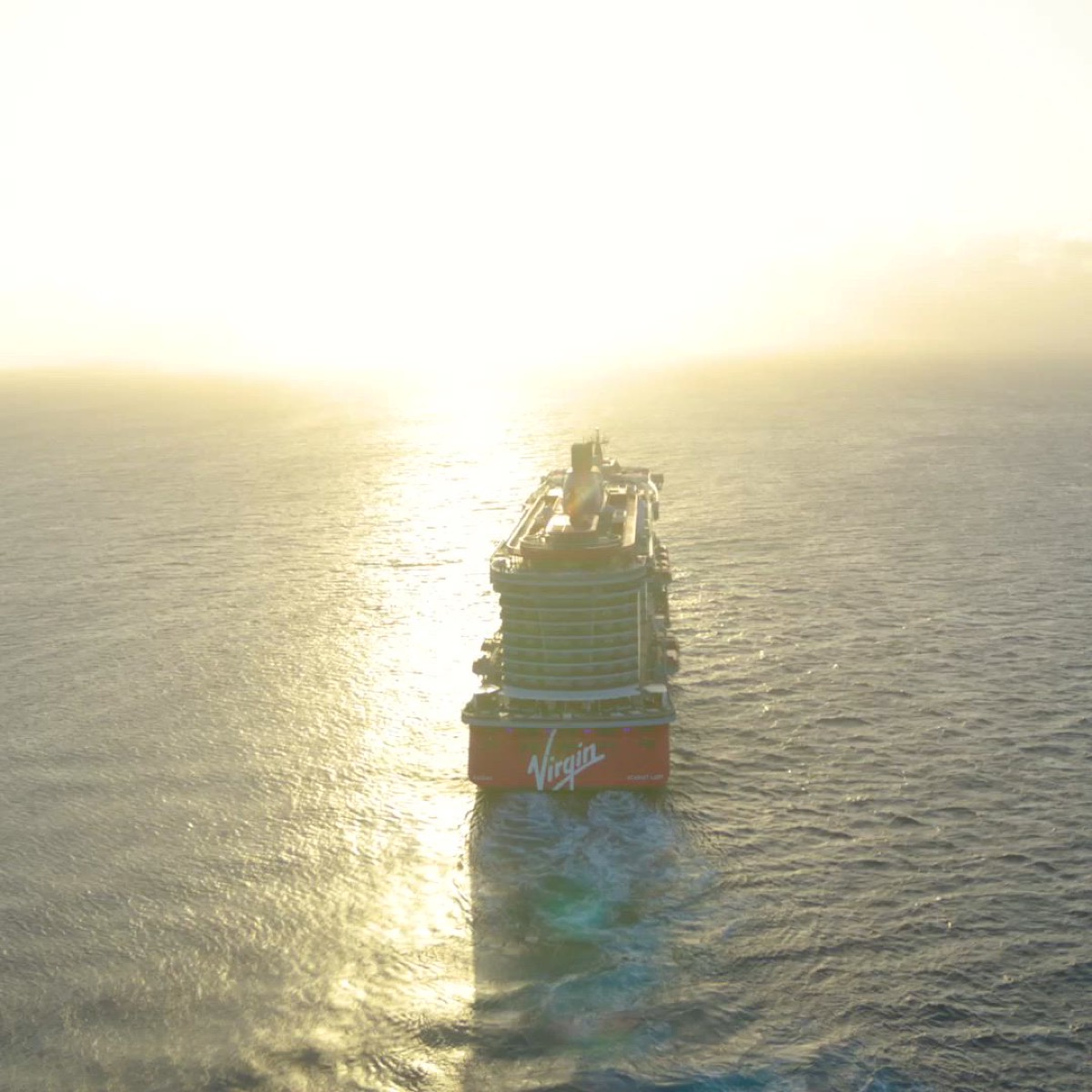 Scarlet Lady sailing at sunset